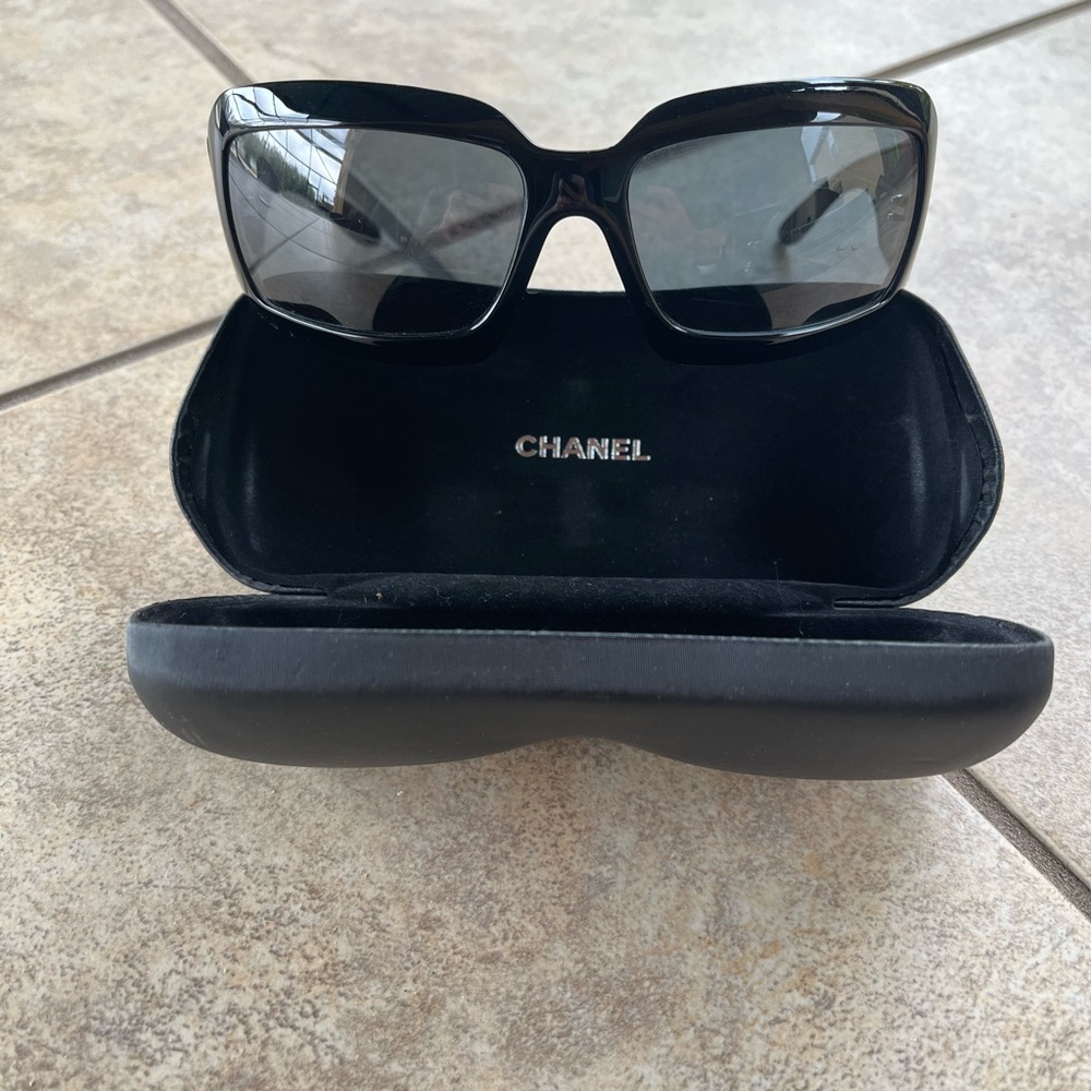 CHANEL Sunglasses with Mother of Pearl logo.